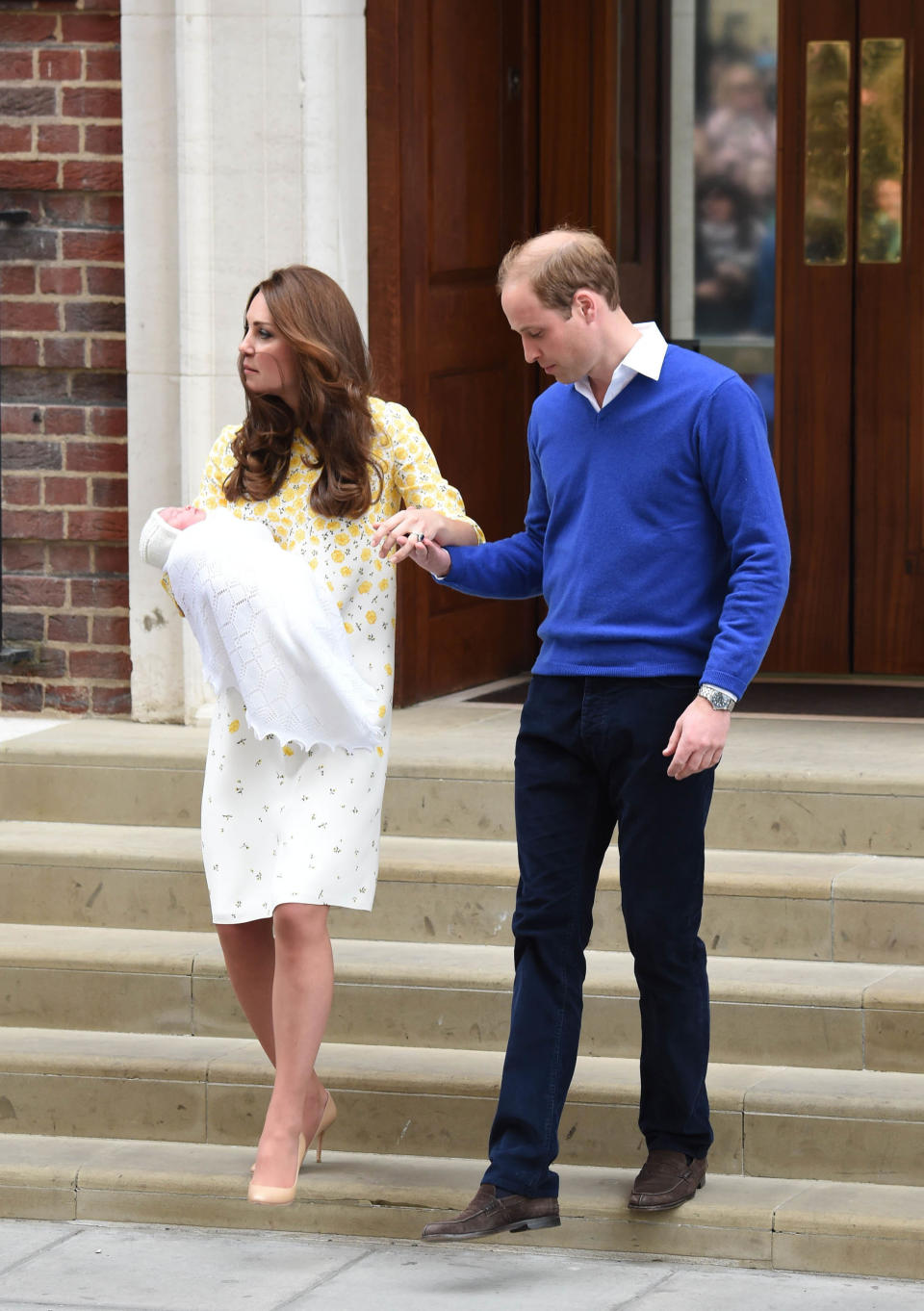 Photo by: KGC-03/STAR MAX/IPx The Princess of Cambridge is seen outside the Lindo Wing of St. Mary's Hospital with her parents Prince William The Duke of Cambridge and Catherine The Duchess of Cambridge.  The Princess was born on Saturday, May 2nd, 2015 at 8:34 AM weighing 8lbs. 3oz. (Star Max/IPX via AP Images)