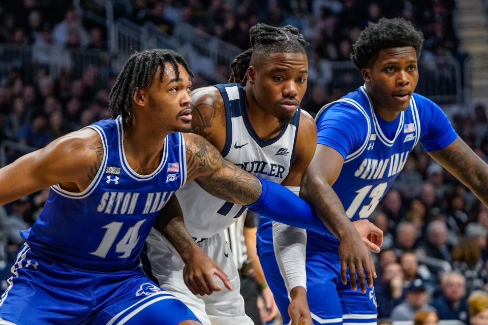 From left, Seton Hall Pirates guard Dre Davis (14), Butler Bulldogs guard Jahmyl Telfort (11) and Seton Hall Pirates guard Jaquan Sanders (13) line up to grab a rebound during a game between the Butler Bulldogs and the Seton Hall Pirates and the Seton Hall Pirates on Saturday, Jan. 13, 2024 at Hinkle Fieldhouse in Indianapolis. Seton Hall Pirates center Elijah Hutchins-Everett (4).