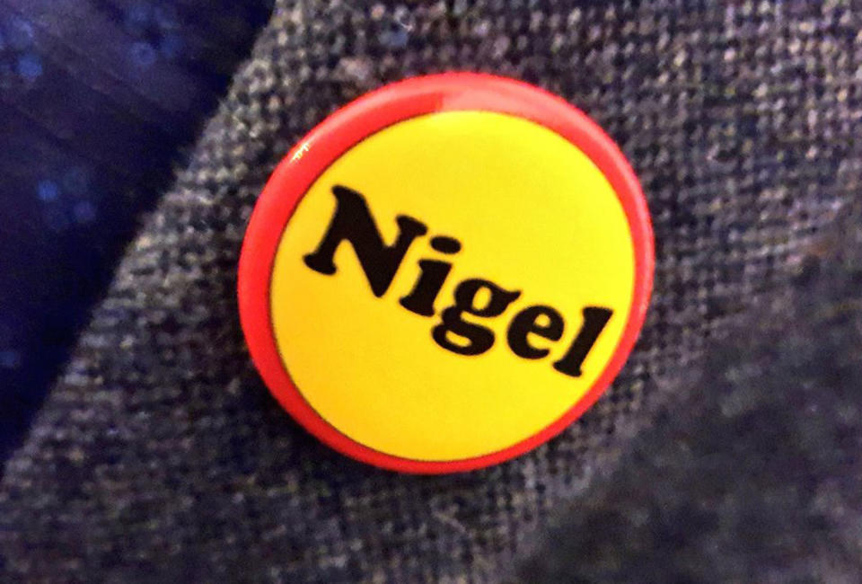 A "Nigel" badge on display at the event (Picture: PA)