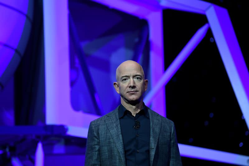 FILE PHOTO: FILE PHOTO: Founder, Chairman, CEO and President of Amazon Jeff Bezos unveils his space company Blue Origin's space exploration lunar lander rocket called Blue Moon during an unveiling event in Washington