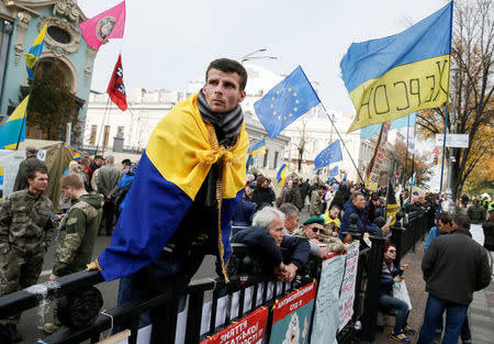 An opposition protester is seen in a tent camp set up near the Ukrainian parliament building in Kiev, Ukraine October 19, 2017. REUTERS/Gleb Garanich