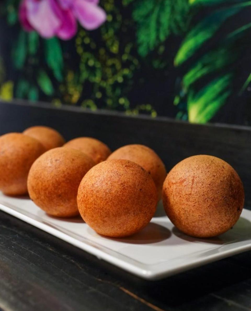 Colombian buñuelos (fluffy cheese fritters) from Mendoza's Colombian Cafe in Brick.