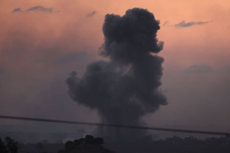 Smoke rises after an explosion following an airstrike on the northern part of the Gaza Strip as seen from the Israeli city of Sderot on Saturday. Photo by Atef Safadi/EPA-EFE