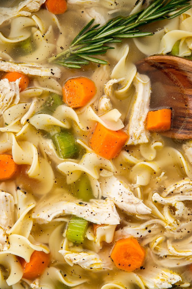 <p>When we're sick, there's only one thing we crave: this chicken noodle soup. If you wanna pack it with more veggies (hey, they're good for you!) throw in some peppers with the onions, or stir in some spinach or kale when it's almost done cooking. </p><p>Get the <a href="https://www.delish.com/uk/cooking/recipes/a31728080/homemade-chicken-noodle-soup-recipe/" rel="nofollow noopener" target="_blank" data-ylk="slk:Chicken Noodle Soup;elm:context_link;itc:0;sec:content-canvas" class="link ">Chicken Noodle Soup</a> recipe.</p>