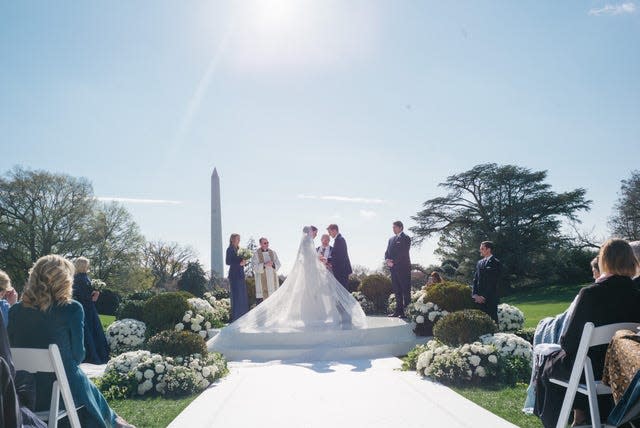 Naomi Biden and Peter Neal's wedding reception on the South Lawn of the White House, with the Washington Monument visible in the background