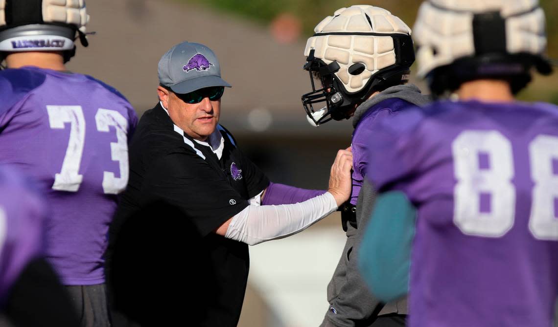 Walhalla football coach Padgett Johnson works with the team as the Razorbacks practice. Johnson has volunteered to coach the 3-A Razorback football team for the past seven seasons.