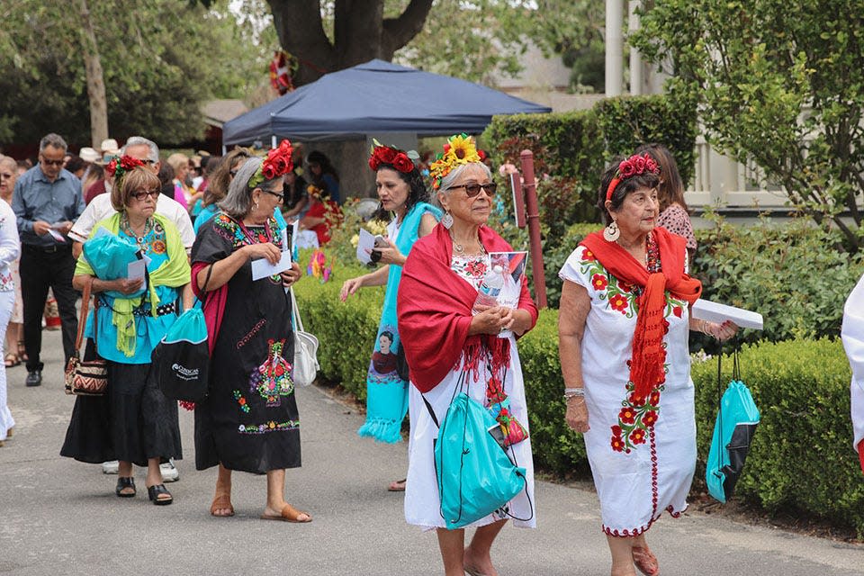 Guests at the 2022 Rebozo Festival walk in their traditional Mexican shawls. This year's festival is Sunday at noon at the Camarillo Ranch House.