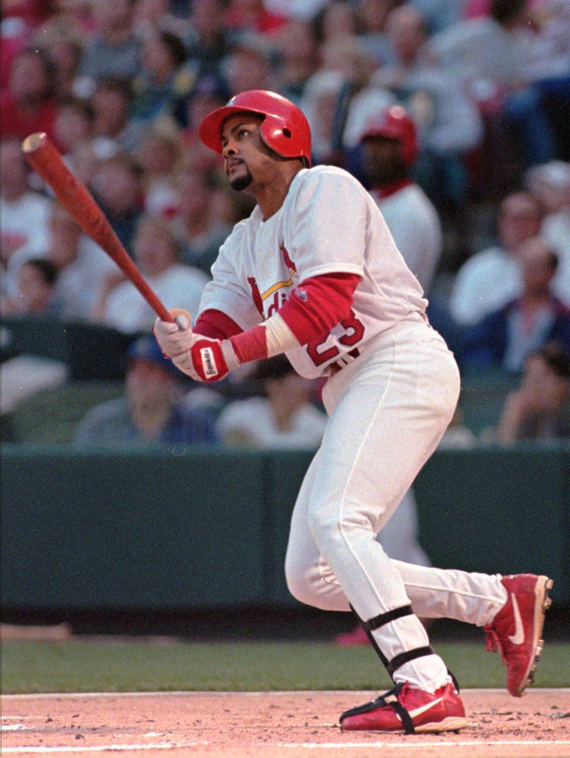 St. Louis Cardinals’ Fernando Tatis watches the flight of his home run in the second inning against the Pittsburgh Pirates Thursday, May 6, 1999 at Busch Stadium in St. Louis. The two-run shot was his 11th of the season. (AP Photo/Tom Gannam)