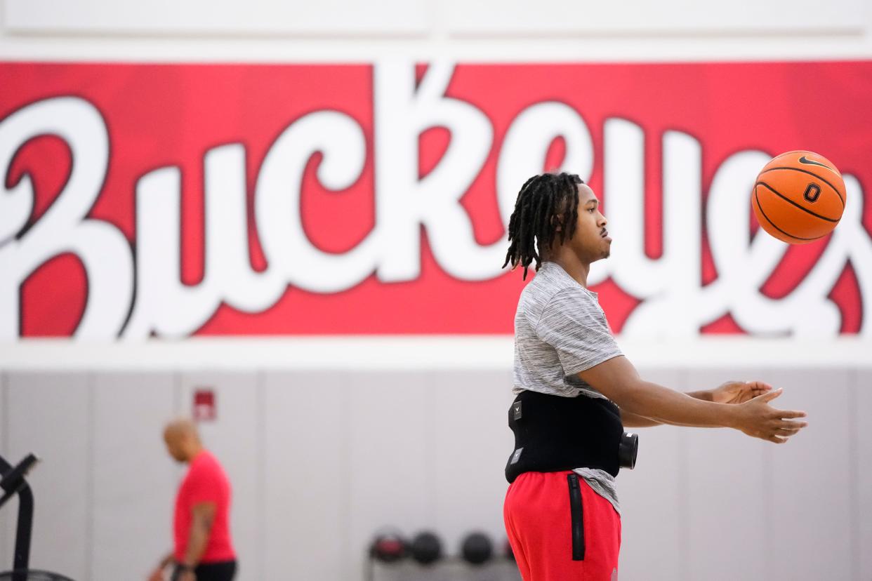 Jul 9, 2024; Columbus, OH, USA; Ohio State Buckeyes guard Meechie Johnson Jr. watches teammates practice during a summer workout in the practice gym at the Schottenstein Center.