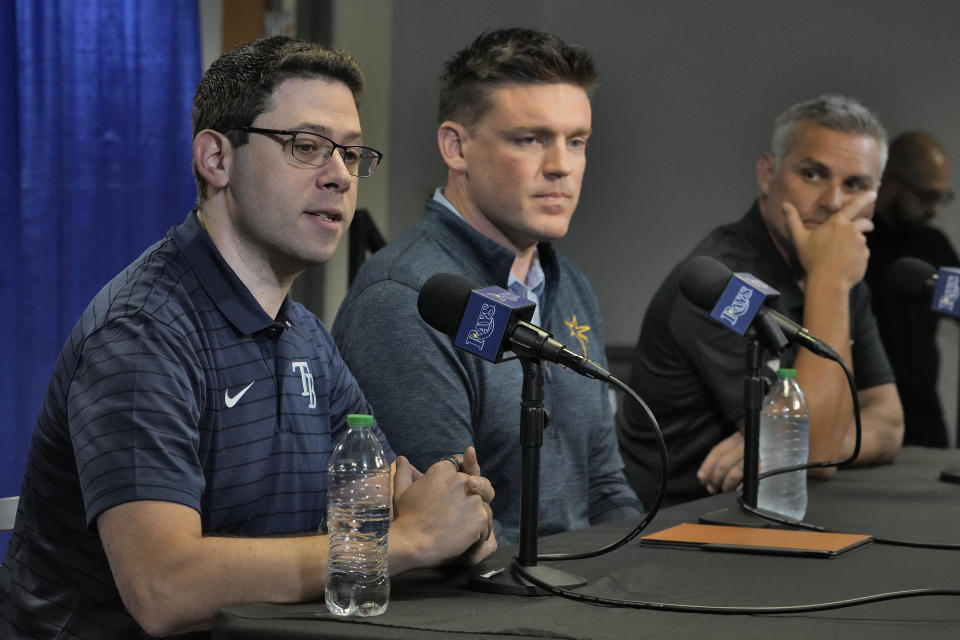 Peter Bendix, left, Tampa Bay Rays Senior Vice President of Baseball Operations & General Manager, sits with Erik Neander President of Baseball Operations, center, and manager Kevin Cash, right, take part in a season ending baseball news conference Monday, Oct. 9, 2023, in St. Petersburg, Fla. The Rays were swept by the Texas Rangers in the wild card round. (AP Photo/Chris O'Meara)