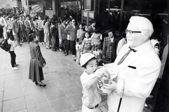 Beijing, 1987. The first KFC store in China.