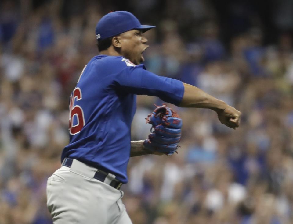 Chicago Cubs relief pitcher Pedro Strop reacts after getting Milwaukee Brewers' Curtis Granderson to strike out and end a baseball game Wednesday, Sept. 5, 2018, in Milwaukee. The Cubs won 6-4. (AP Photo/Morry Gash)