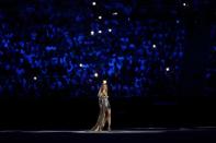 <p>Supermodel Gisele Bundchen walks as The Girl From Ipanema during the Bossa segment during the Opening Ceremony of the Rio 2016 Olympic Games at Maracana Stadium on August 5, 2016 in Rio de Janeiro, Brazil. (Photo by Jamie Squire/Getty Images) </p>