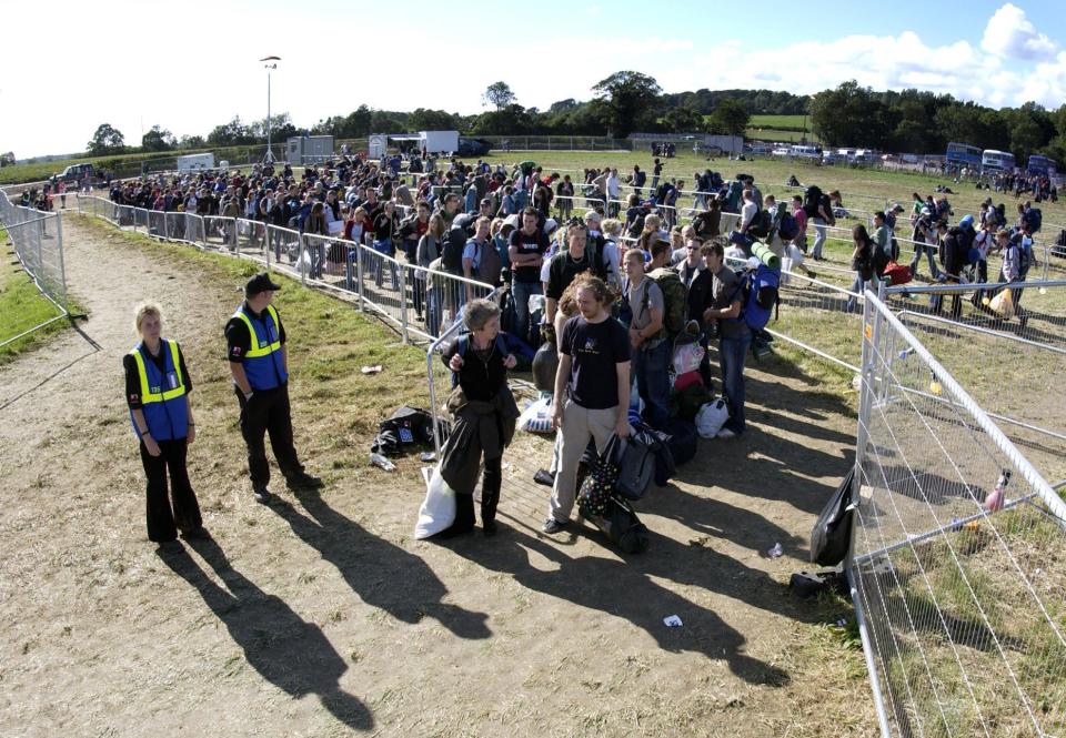 Festival-goers arrive on the eve of the Glastonbury Festival, held at Worthy Farm in Pilton, Somerset.