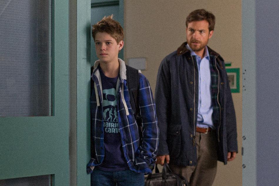 This film image released by LD Entertainment shows Colin Ford, left, and Jason Bateman in a scene from "Disconnect." (AP Photo/LD Entertainment)