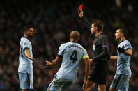 Football - Manchester City v FC Barcelona - UEFA Champions League Second Round First Leg - Etihad Stadium, Manchester, England - 24/2/15 Manchester City's Gael Clichy is shown a red card by referee Felix Brych Reuters / Phil Noble Livepic EDITORIAL USE ONLY.