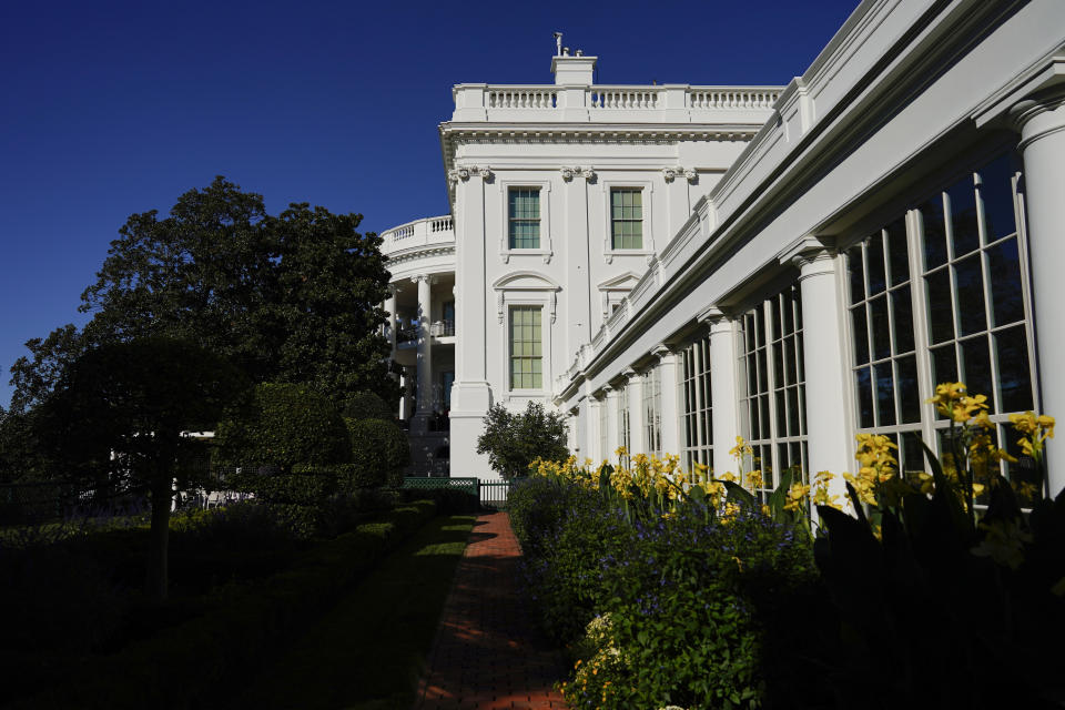 The White House and the Jacqueline Kennedy Garden are seen during the White House Fall Garden Tour in Washington, Saturday, Oct. 8, 2022. (AP Photo/Carolyn Kaster)