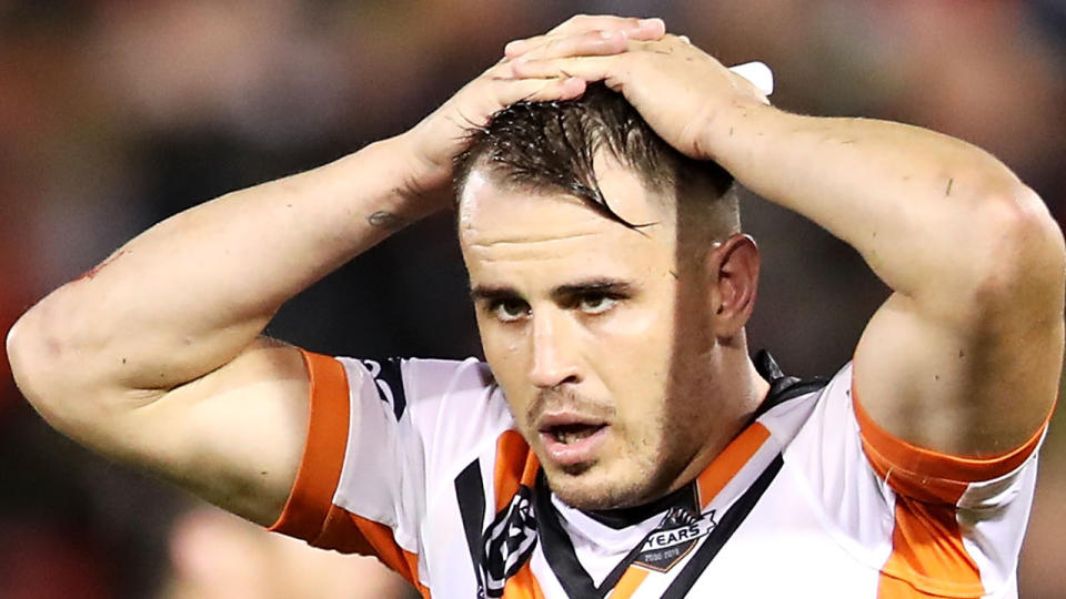 Wests Tigers veteran Josh Reynolds, pictured, has been charged with an alleged domestic violence offence.