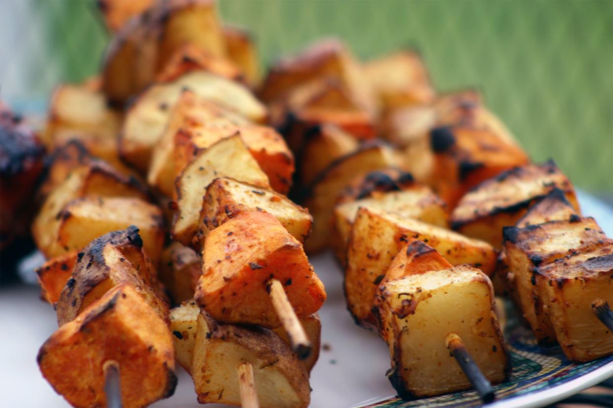 Grilled potatoes on skewers