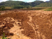 A landslide is seen from top of a hill in Brebes, Indonesia February 22, 2018, in this image obtained from social media. Aji Santoso/via REUTERS