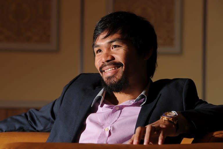 Manny Pacquiao during an AFP interview in Macau on July 27, 2013. The Philippine great is harbouring thoughts of running for president in his beloved homeland when he finally hangs up his gloves, he revealed to AFP in an exclusive interview