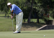 Dicky Pride gestures during his putt on the fifth green during the second round of the Byron Nelson Championship golf tournament Friday, May 18, 2012, in Irving, Texas. Pride is 6-under going into the weekend. (AP Photo/Tony Gutierrez)