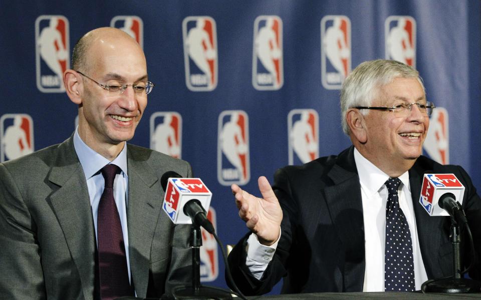 NBA Deputy Commissioner Adam Silver, left, laughs as Commissioner David Stern gestures toward him during a basketball news conference following Board of Governors meetings in New York, Thursday, Oct. 25, 2012. Stern announced he will retire on Feb. 1, 2014, 30 years after he took charge of the league. He will be replaced by Silver. (AP Photo/Kathy Willens)