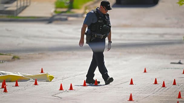 PHOTO: Evidence markers filled the street as police were investigating the scene following a shooting on June 25, 2023 in Kansas City. (Tammy Ljungblad/The Kansas City Star/TNS via Newscom)