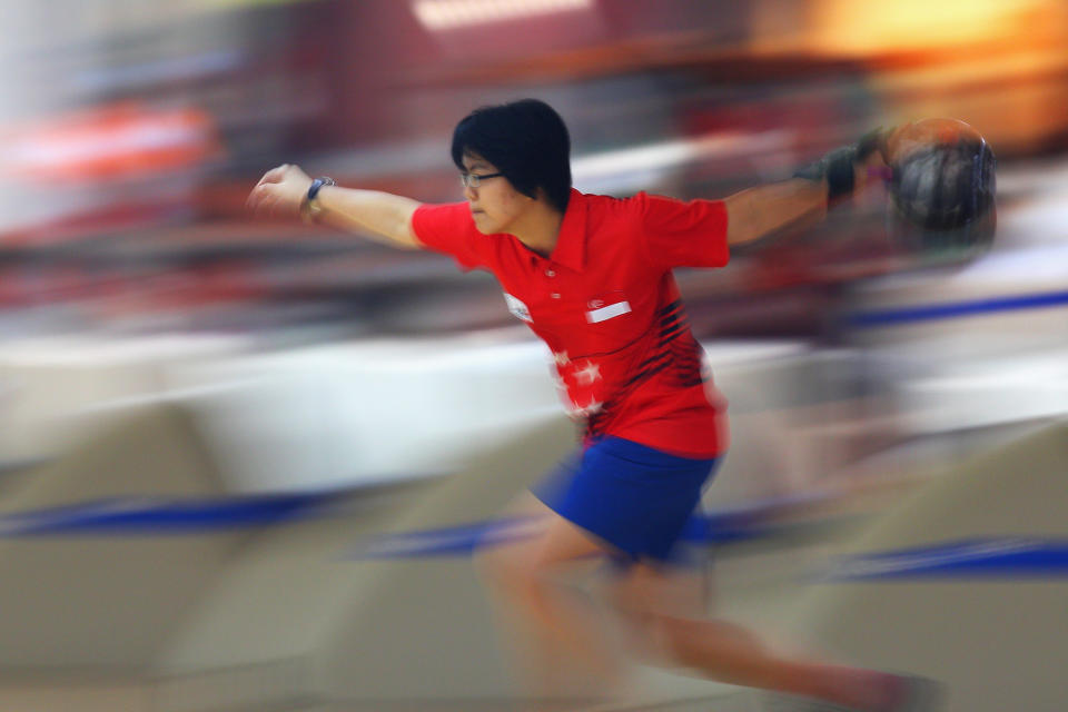 JAKARTA, INDONESIA - NOVEMBER 16:  Cherie Tan of Singapore bowls during the women's doubles bowling on day six of the 2011 Southeast Asian Games at Arena Bowling Jaya Ancol on November 16, 2011 in Jakarta, Indonesia.  (Photo by Cameron Spencer/Getty Images)