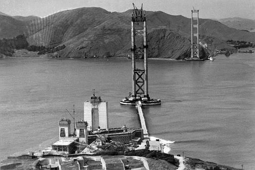 The construction of the Golden Gate Bridge, which will link Fort Point, bottom, with Marin County, Calif., top, is seen as work progressed, 1934. (AP Photo/Redwood Empire Association)