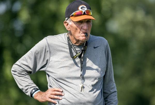 Gillespie football coach Don Dobrino, 80, watches his team practice ahead of the 2015 season. He passed away Sunday aged 86.