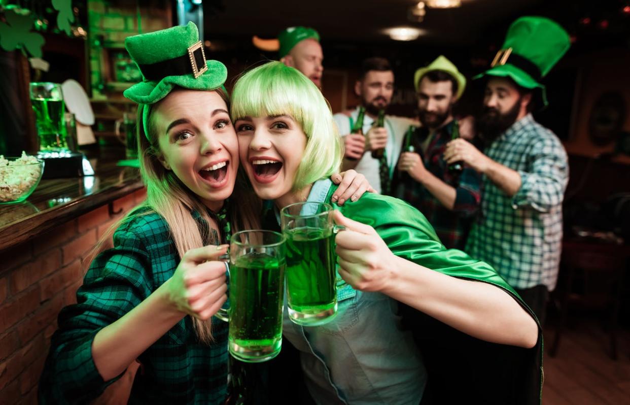 <span class="caption">St. Patrick and Ireland may be mostly on your mind on March 17, but it's also a time to toast your liver.</span> <span class="attribution"><a class="link " href="https://www.shutterstock.com/image-photo/two-girls-wig-cap-photographed-bar-1015699546" rel="nofollow noopener" target="_blank" data-ylk="slk:VGstockstudio/Shutterstock.com;elm:context_link;itc:0;sec:content-canvas">VGstockstudio/Shutterstock.com</a></span>