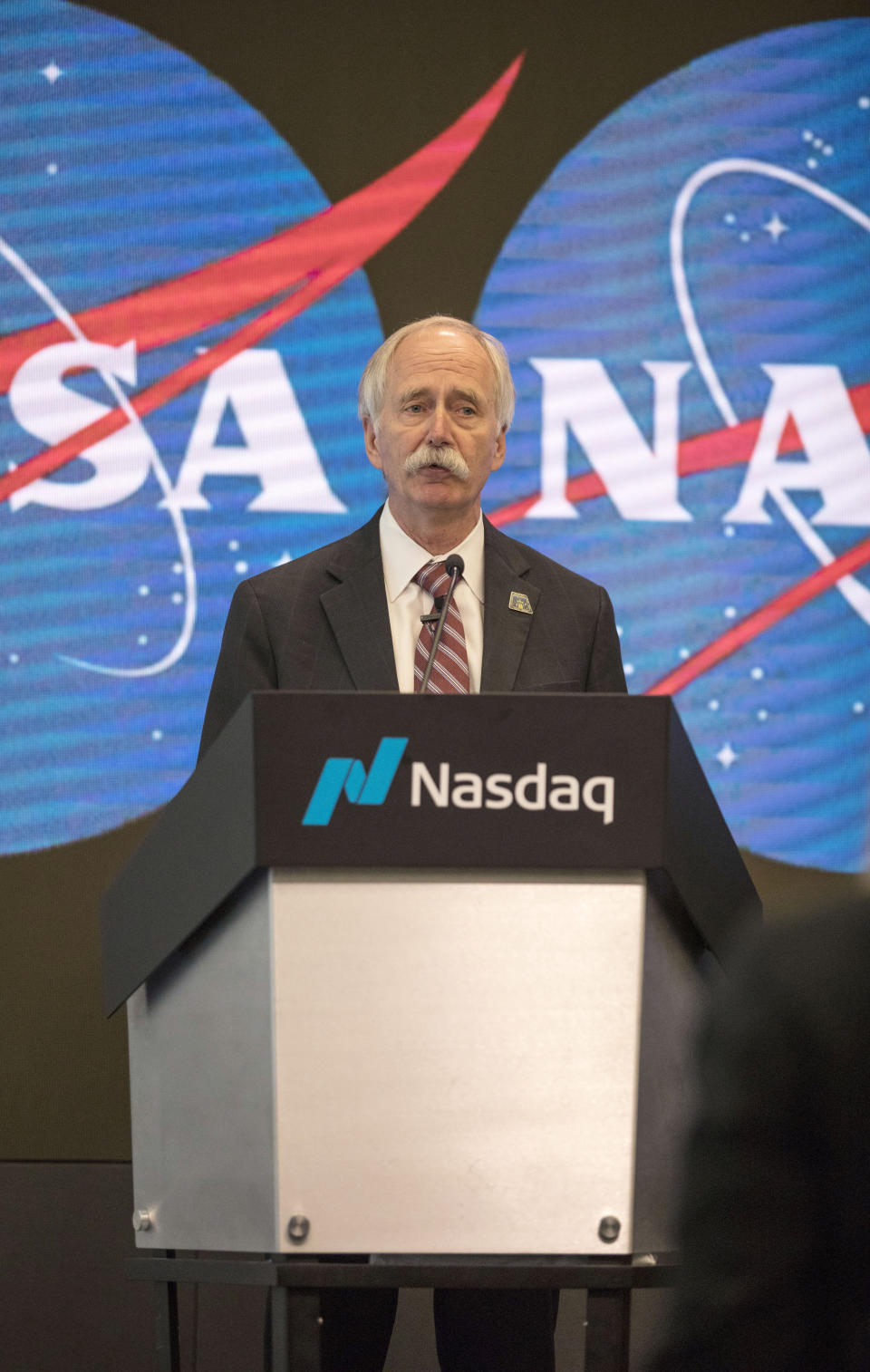 Jeff Dewit, NASA's Chief Financial Officer, speaks during a news conference at Nasdaq in New York on Friday, June 7, 2019. NASA announced that the International Space Station will be open for private citizens, with the first visit expected to be as early 2020. (AP Photo/Marshall Ritzel)