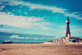 Blackpool Tower and pier taken from beach.