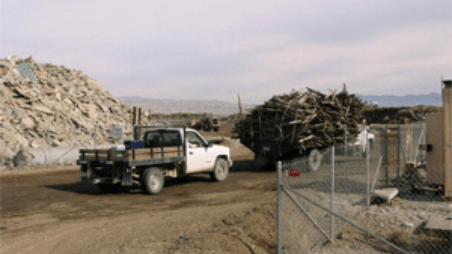 The judge's order has put an end to illegal disposal at the Lawson Dumpsite, such as this load of hazardous treated wood waste. (Environmental Protection Agency)