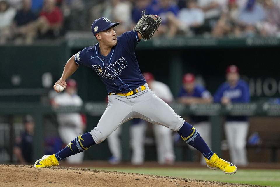 FILE - Tampa Bay Rays relief pitcher Robert Stephenson winds up to deliver to a Texas Rangers batter during the sixth inning of a baseball game Tuesday, July 18, 2023, in Arlington, Texas. Right-handed reliever Robert Stephenson has agreed to a $33 million, three-year contract with the Los Angeles Angels. The Angels announced the deal Tuesday, Jan. 23, 2024, for the 30-year-old Stephenson, who joins his fifth major league team. (AP Photo/Tony Gutierrez, File)