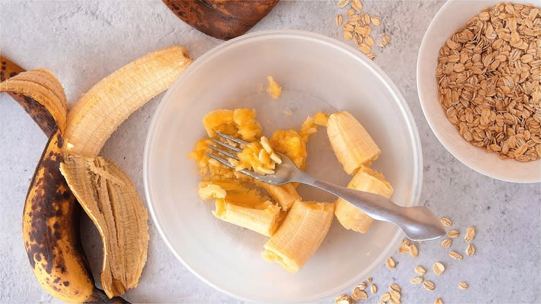 Mashed banana in mixing bowl 