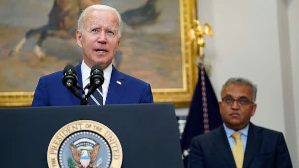 PHOTO: President Joe Biden, left, standing with White House COVID-19 Response Coordinator Ashish Jha, right, speaks about the newly approved COVID-19 vaccines for children under 5, June 21, 2022, at the White House. (Susan Walsh/AP)