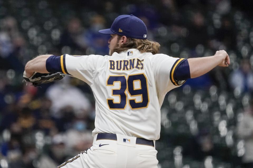 Milwaukee Brewers starting pitcher Corbin Burnes throws during the first inning of a baseball game against the Miami Marlins Monday, April 26, 2021, in Milwaukee. (AP Photo/Morry Gash)