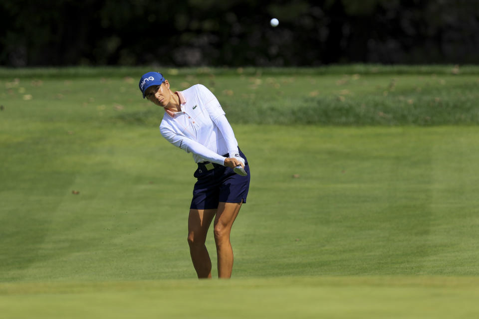 Azahara Munoz, of Spain, plays a shot from the fourth fairway during the second round of the LPGA Tour Kroger Queen City Championship golf tournament in Cincinnati, Friday, Sept. 9, 2022. (AP Photo/Aaron Doster)