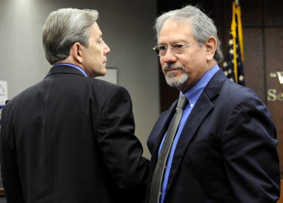 Peter Heller, left, defense attorney for Clifford Friend, the Lighthouse Point man charged in the 18-year disappearance of his wife, and Michael Von Zamft, prosecutor, right, during a hearing in Judge Beth Bloom’s courtroom, Friday, April 13, 2012. Von Zamft won a conviction in the case.