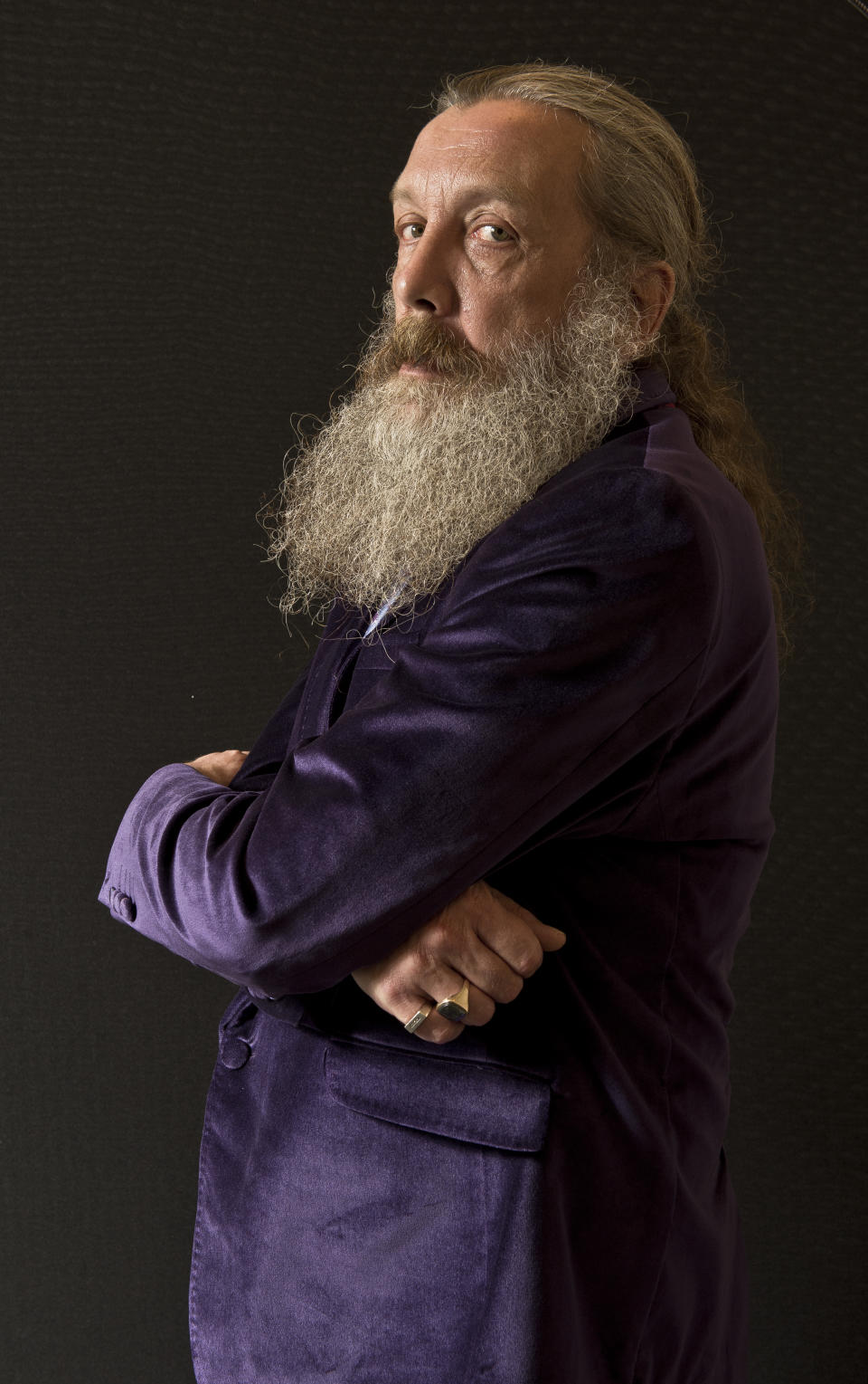 LONDON, UNITED KINGDOM - SEPTEMBER 6: Portrait of English comic book writer Alan Moore, taken on September 6, 2013. Moore is often considered the finest writer in the comics medium, and is best known for his graphic novels Watchmen and V For Vendetta. (Photo by Kevin Nixon/SFX Magazine via Getty Images) 