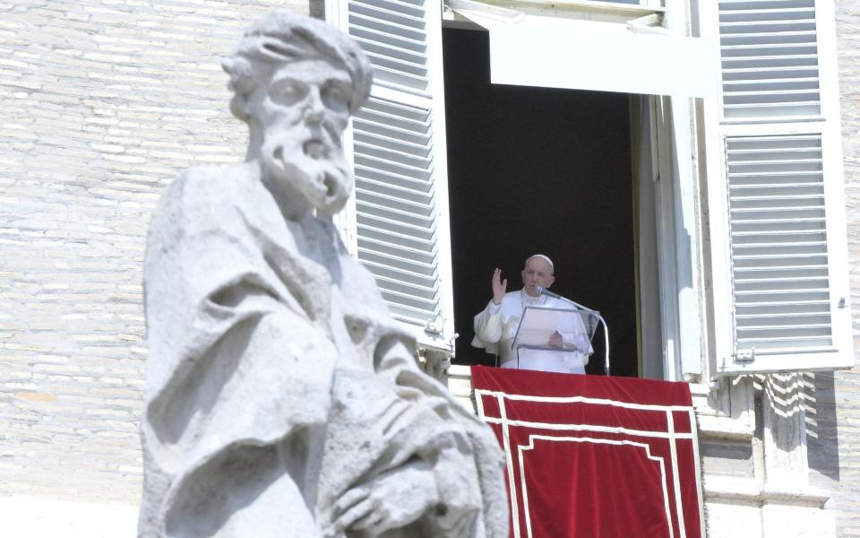 Pope Francis leads Sunday Angelus prayer from the window of his office overlooking Saint Peter's Square at the Vatican on 19 September 2021 - Claudio Peri/Shutterstock