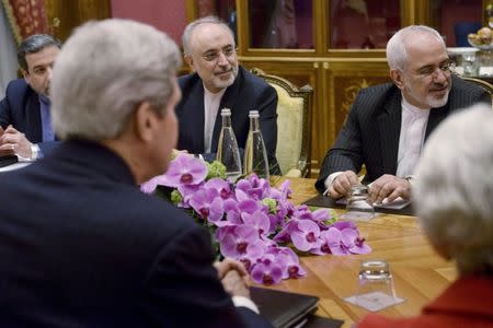 (From left) Iranian Deputy Foreign Minister Abbas Araghchi, US Secretary of State John Kerry, Head of Iranian Atomic Energy Organisation Ali Akbar Salehi, Iranian Foreign Minister Javad Zarif and US Under Secretary for Political Affairs Wendy Sherman wait for a meeting at the Beau Rivage Palace Hotel on March 27, 2015 in Lausanne. REUTERS/Brendan Smialowski/Pool