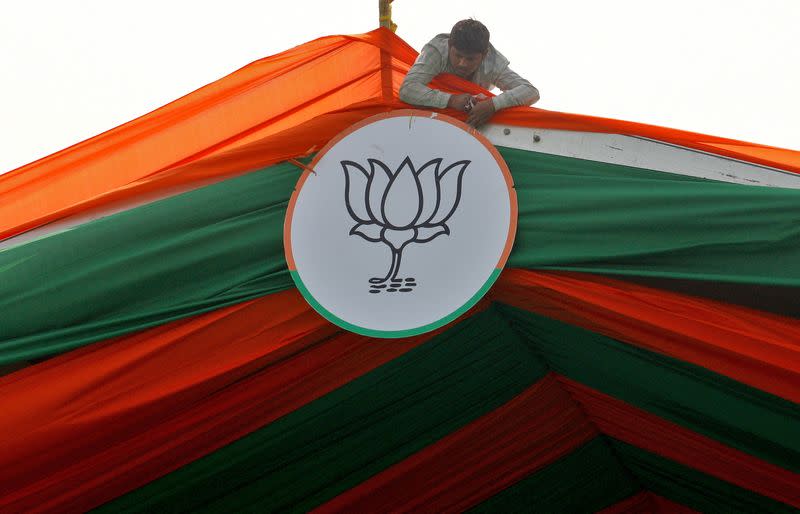 FILE PHOTO: Supporters of BJP attend a rally being addressed by PM Modi, in Prayagraj