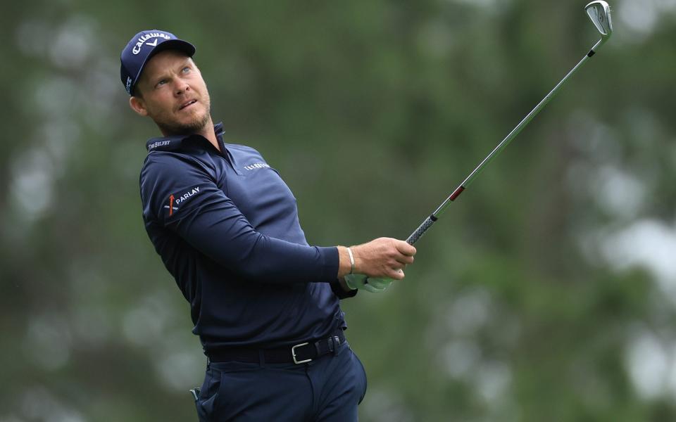 Danny Willett of England plays his tee shot on the fourth hole during the first round of the 2024 Masters Tournament