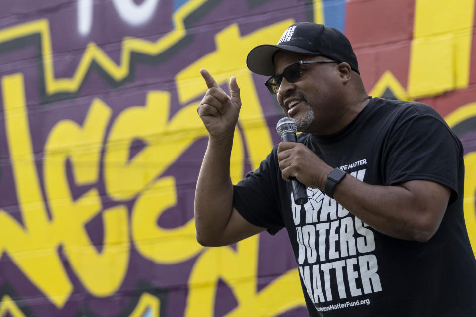 Cliff Albright, co-founder of Black Voters Matter, talks about expanding voting rights at the John Lewis Advancement Act Day of Action, a voter education and engagement event, Saturday, May 8, 2021, at King's Canvas in Montgomery, Ala. (AP Photo/Vasha Hunt)