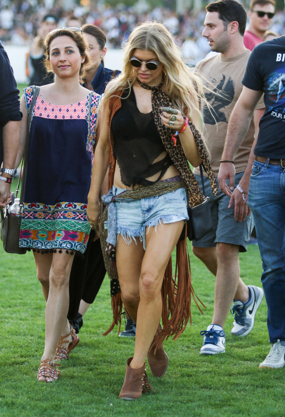 Forty-year-old Fergie channeled Daisy Duke and Jimi Hendrix wearing short cutoff denim shorts and lots of silk scarves.