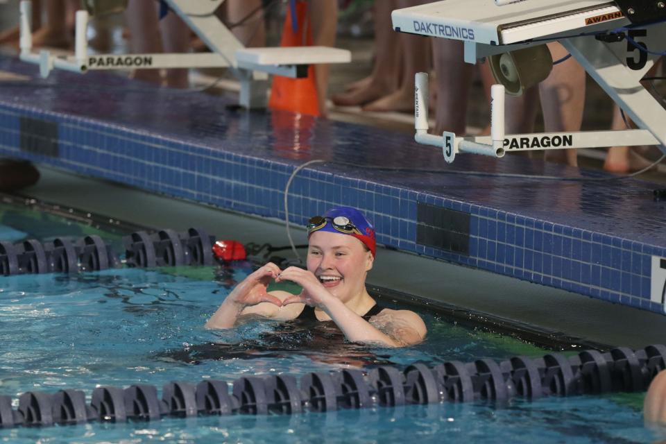 Seaman sophomore Avery Walz is jubilant after placing first in the 100 Yard Breaststroke at the Class 5-1A Girls State Championship Saturday at Shawnee Mission School District Aquatic Center.