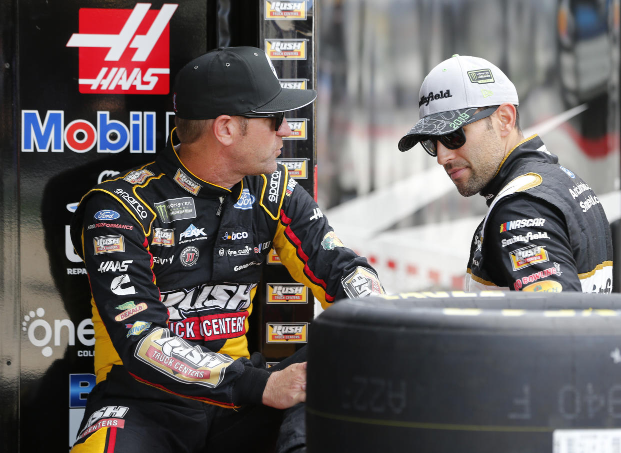 Clint Bowyer (L) is getting Aric Almirola's crew chief in 2020. Almirola is getting Bowyer's crew chief. (Photo by Brian Lawdermilk/Getty Images)